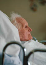 Picture of an elderly, bed-ridden man