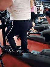 Photo of overweight person on an elliptical trainer