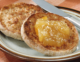 English muffin with mixture on a plate.