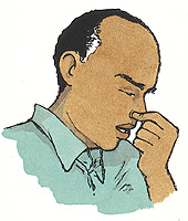 Man tilting head forward and pinching nose.