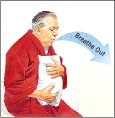 Man breathing out slowly through his mouth