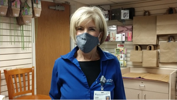 MCH Volunteer wearing a face mask