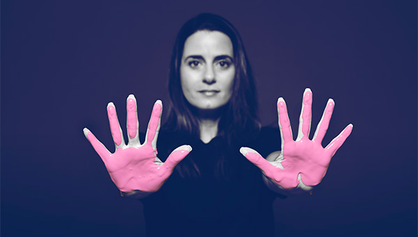 A woman participates in the "It's in Our Hands" breast cancer awareness campaign.