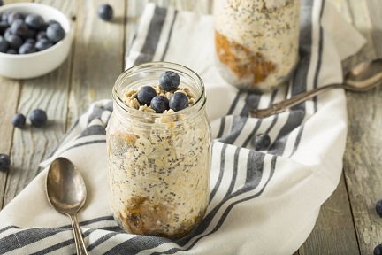 overnight oats with blueberries in a mason jar