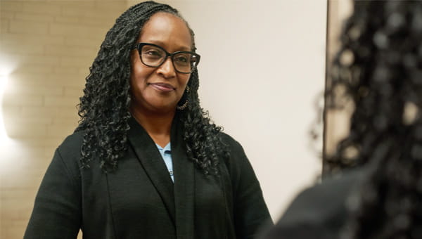 lady preparing for mammogram.