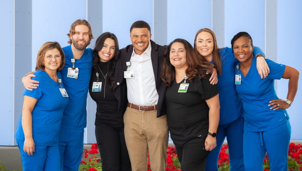 Group of BayCare team members standing together smiling for a photo.