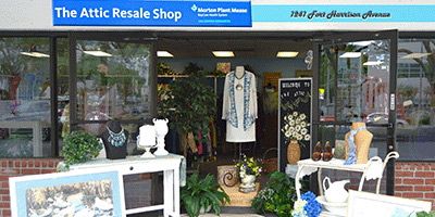 Front of the Attic Resale Shop with merchandise displayed