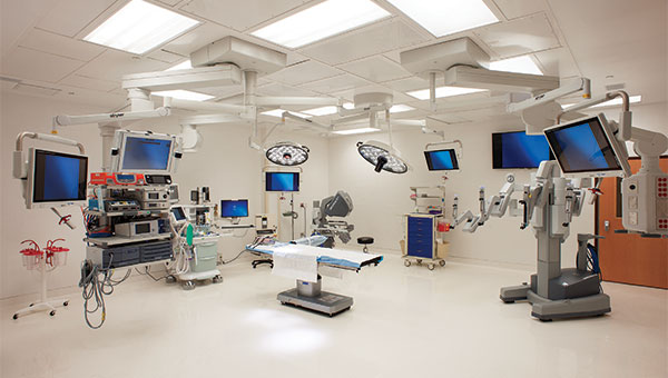 An operating room with robotic surgery equipment