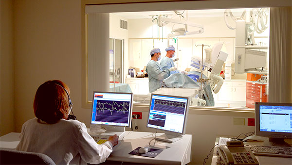 Surgical team performing surgery in a hospital operating room