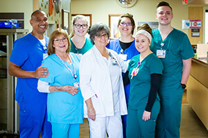 A group of smiling BayCare team members