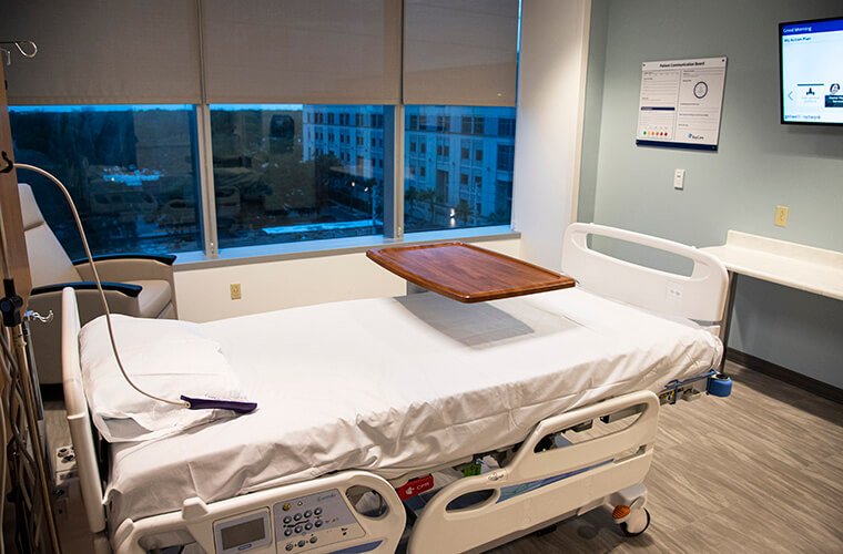 Interior patient room in new SJH tower with a window view