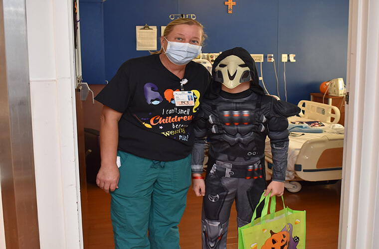 St. Joseph's Children's Hospital health care workers trick o treating with patients in the hospital