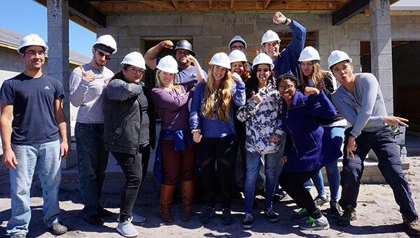 Residents volunteering with Habitat for Humanity