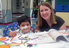 Child life specialist offering procedural support