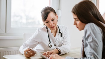 female doctor and female patient discuss care